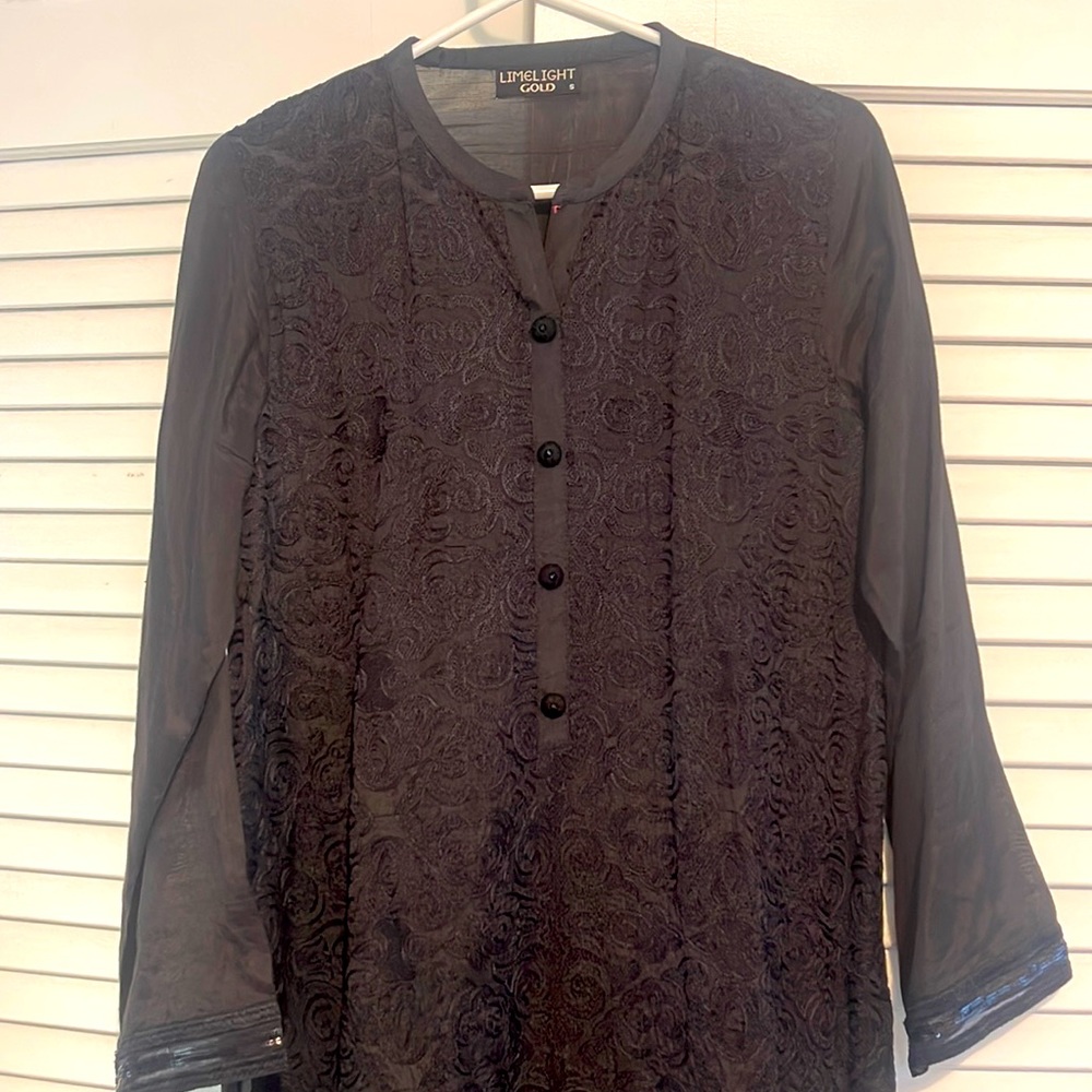 Black shirt with tassel